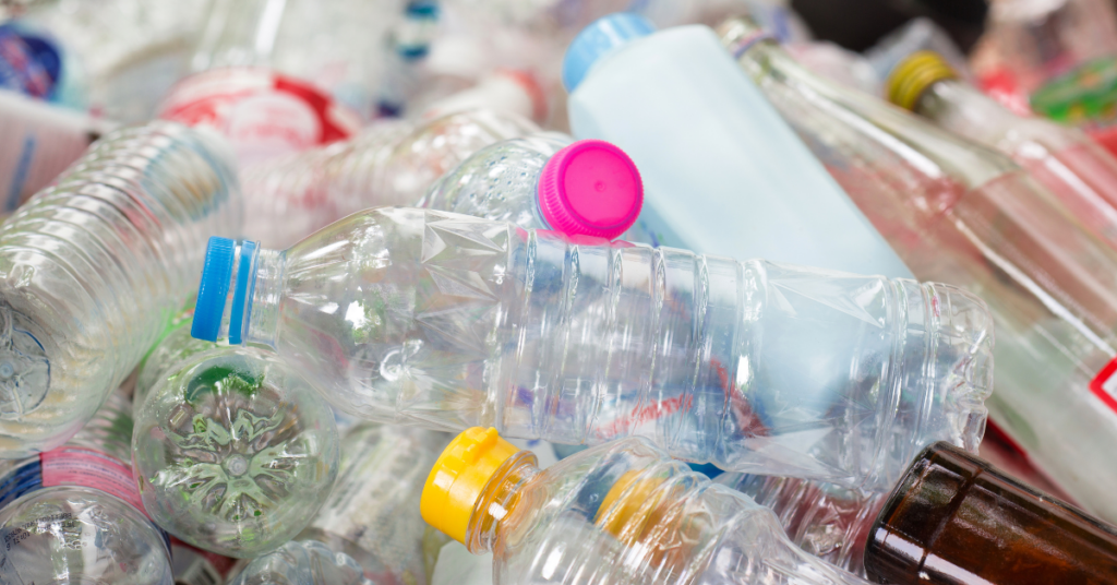 pile of plastic bottles that can be recycled as a part of waste management services