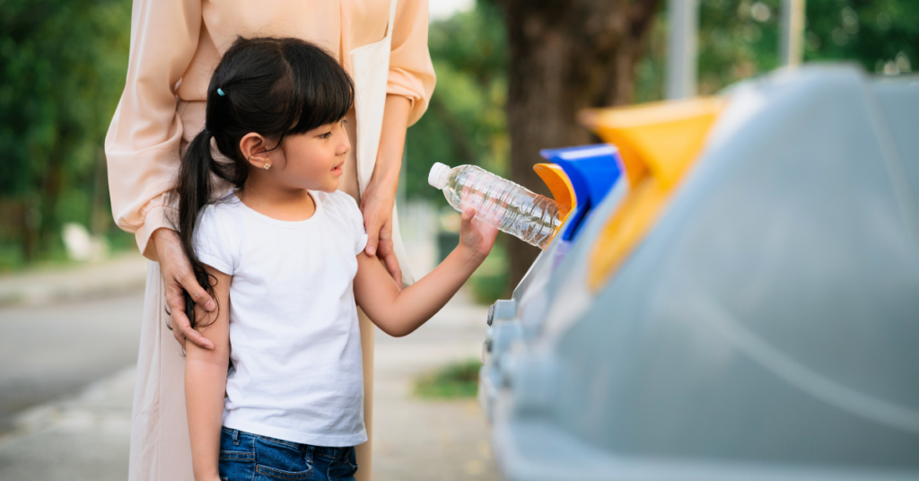 park with recycling options encouraging community involvement with young girl recycling plastic